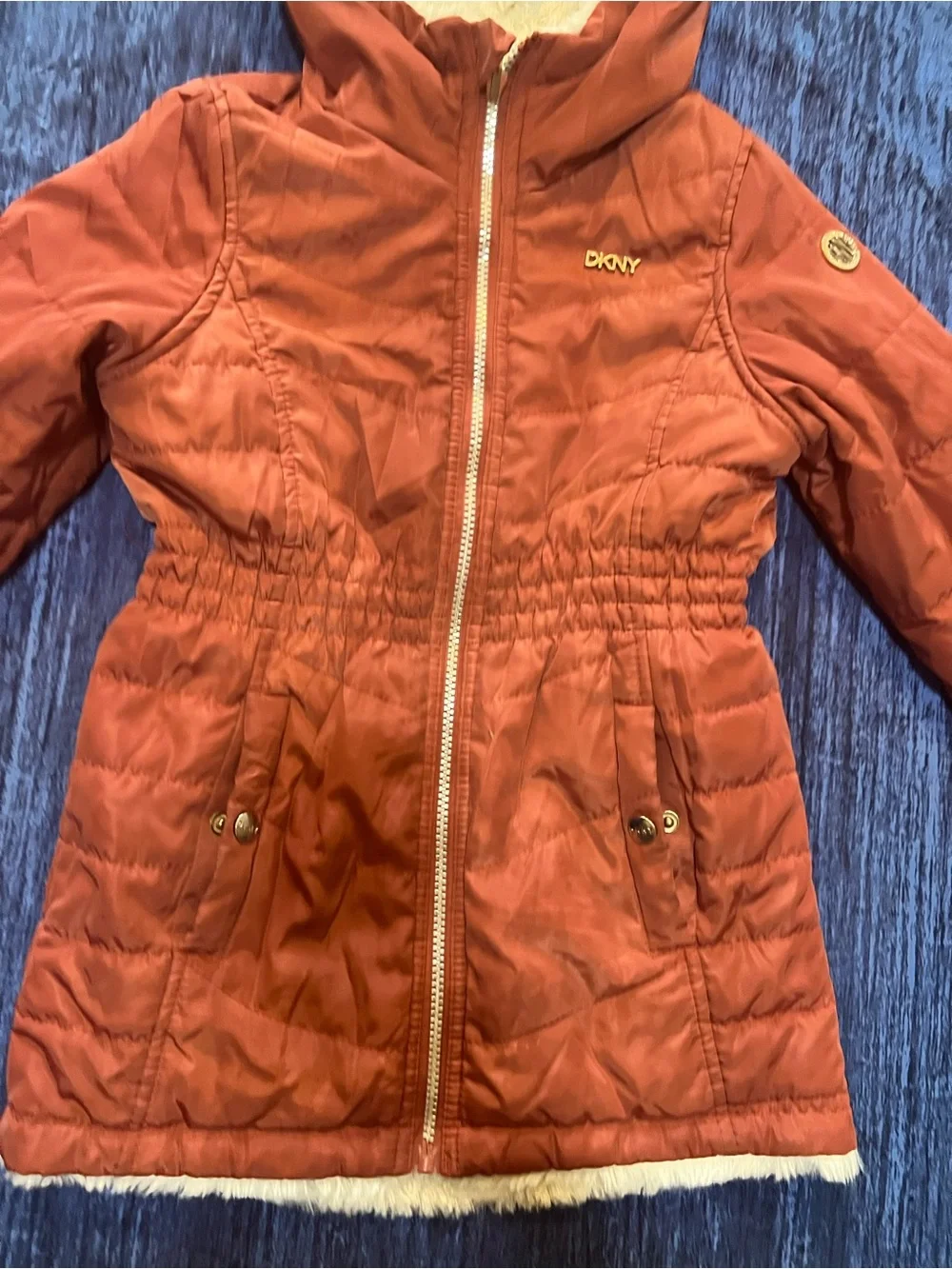 DKNY quilted zip-up jacket with a hooded, fleece-lined design for Kids